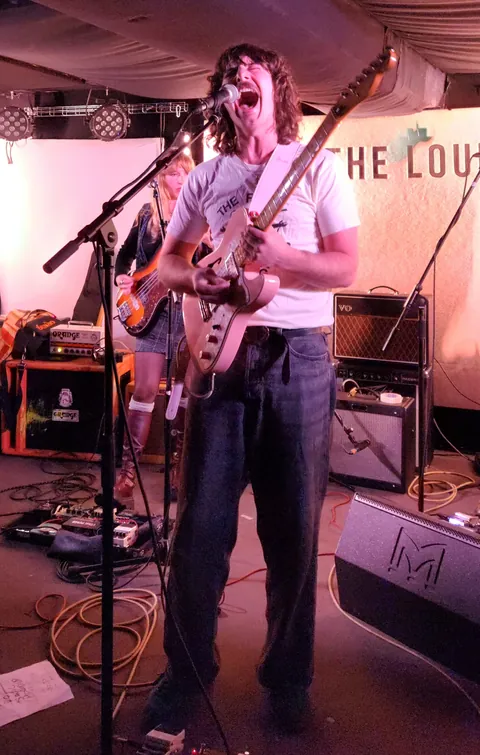 Pigeon Wigs, a Cardiff-based five-piece, took to the stage in a haze of psychedelic fuzz served with a smile