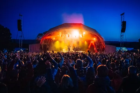 Headliners Bananarama on the Lake Stage with Chew Valley Lake behind them - perfect end to the festival