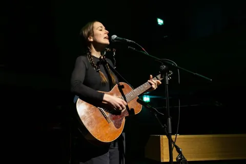 Her set is a mix of inspirational covers and original material