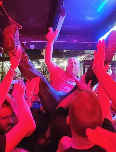 Festival organiser Andy Wilkinson earned his nickname after breaking the rules to crowdsurf at a Knives gig