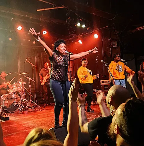 Lena Hibbert embraces and embodies her father’s energy with her live performance